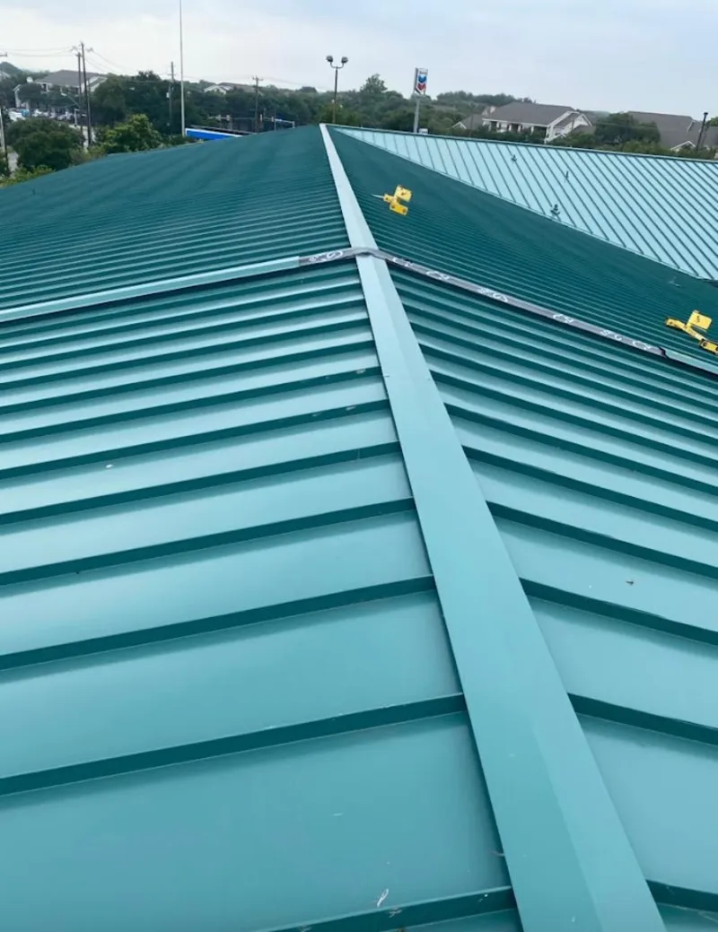 Green commercial metal roof ridge and valley for Metal Roof Repair in Lakeland